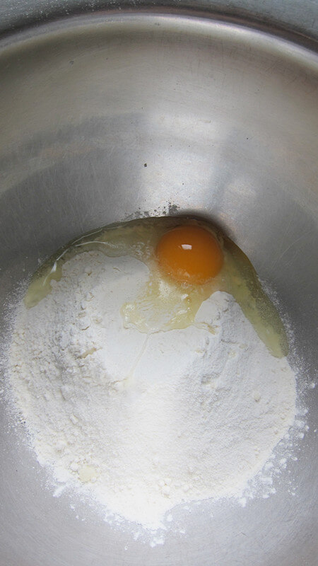 Add baking powder, eggs, and coconut flour to the flour.