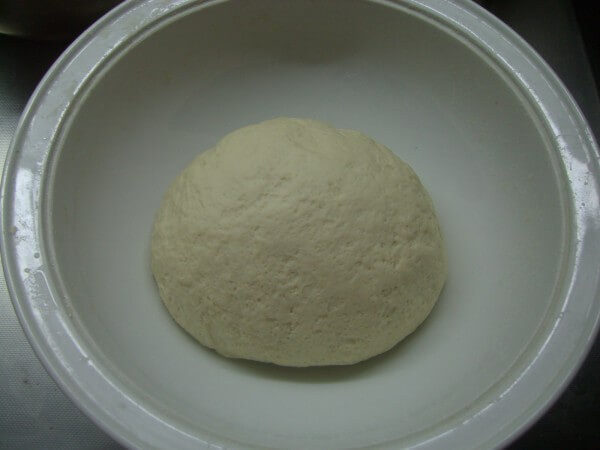 Add baking powder and white sugar to the flour.