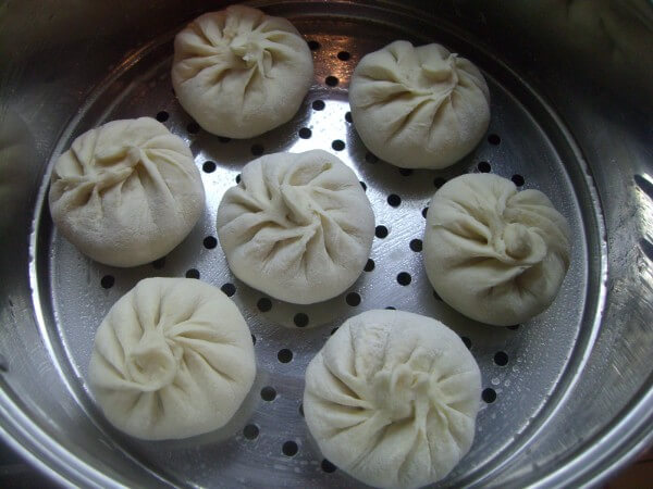 Place the wrapped buns on a drawer of oil.