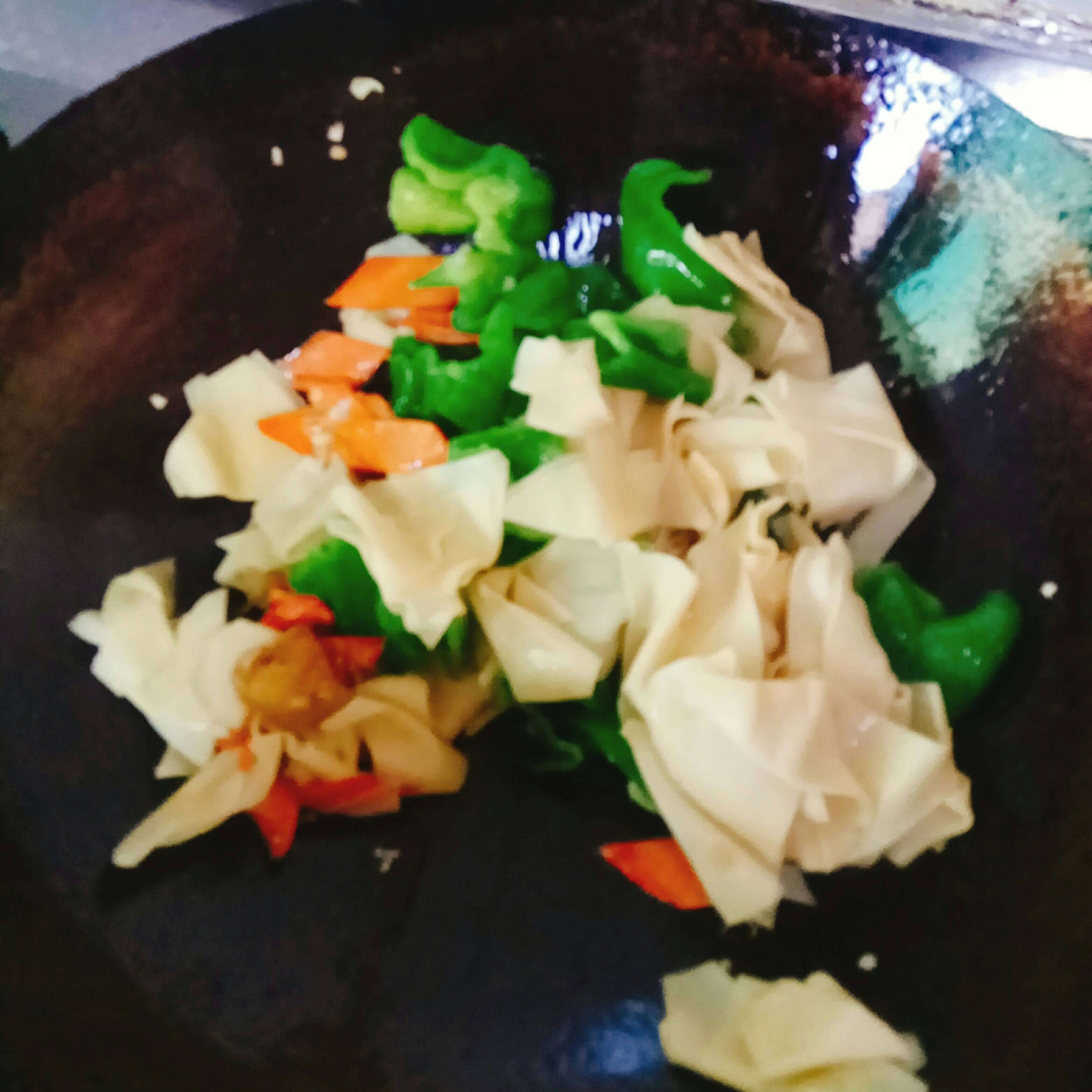 Add some soy sauce, salt, garlic and dried tofu to stir fry evenly