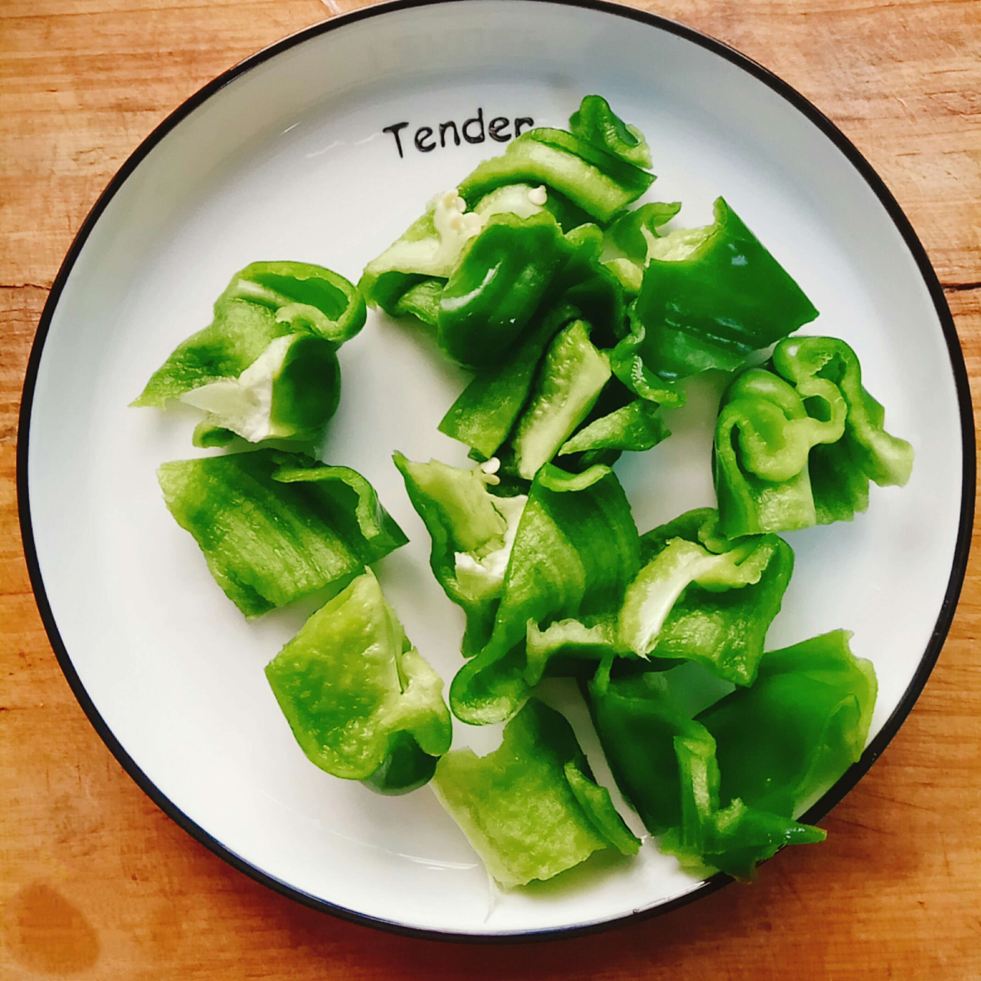 Cut the green peppers to pieces