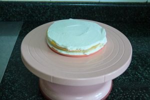 Place the second slice of cake