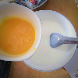 Pour in the yolk mixture