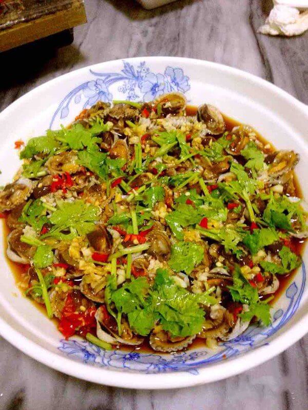 Add the light soy sauce, vinegar and cilantro
