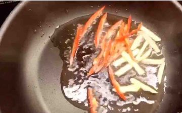Add gingers and peppers to stir fry