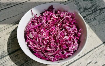 Wash and shred the purple cabbage