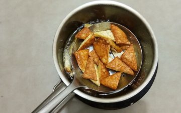 add the dried tofu, and fry them on the small and medium fire