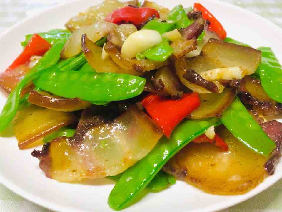 Stir-fry the bacon and stir out part of the fat