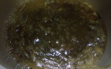 Peel and core the dates in a nonstick pot over high heat. Bring to a boil over medium heat with brown sugar