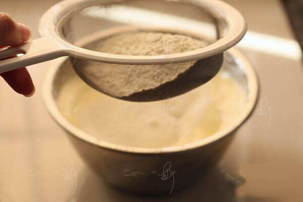 Sift in the low-gluten flour