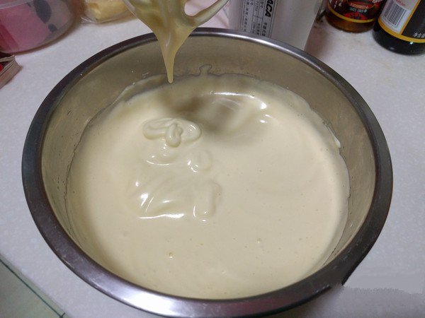 Whip the eggs with an electric whisk