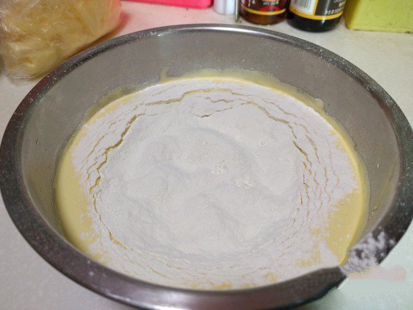 Sift in the mixture of flour and baking powder