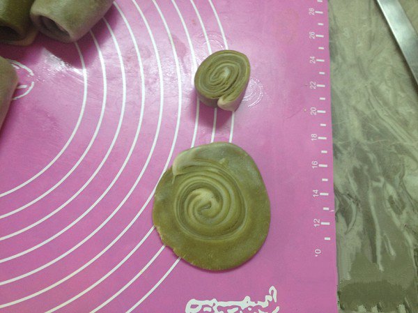 Cut into pieces, press into circles, turn over and add the purple potato filling