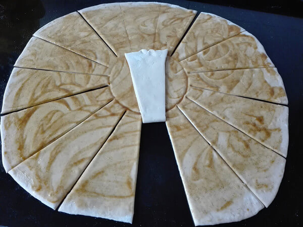 Fold 1 piece of dough into a small circle