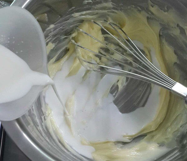 Add 70g milk and stir well