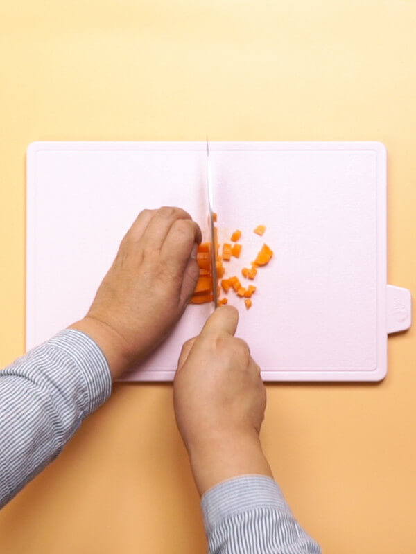 Diced carrots and minced greens