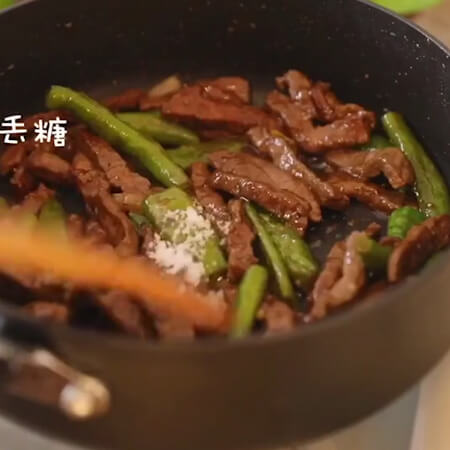 Add oyster sauce, crushed black pepper,