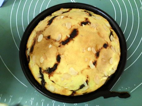 The bread is golden on top and comes out of the oven.