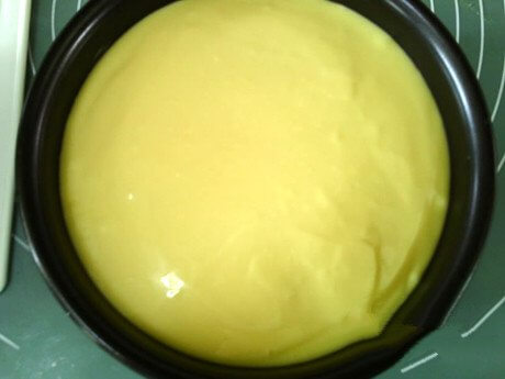 Pour in the cheese paste and smooth