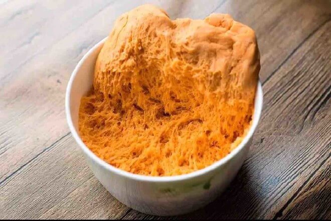 Put the dough in a bowl, cover with plastic wrap,
