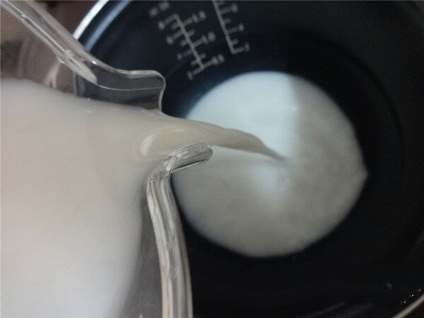 After beating, strain the juice into a saucepan.