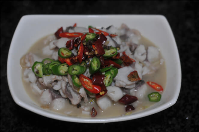 Remove it, place it in a bowl, and sprinkle all the pepper segments on it