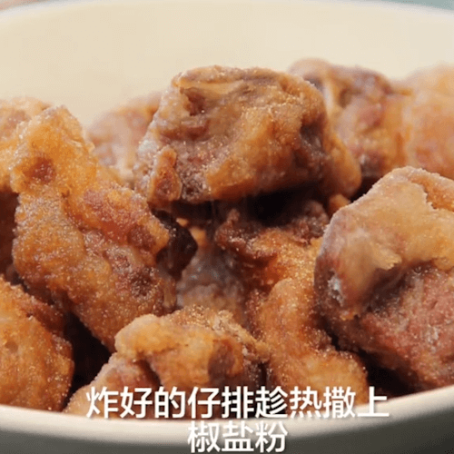 Sprinkle the fried chops with pretzels while hot.