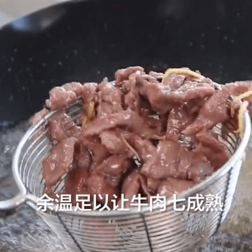 Beef is fried in a pan until it dies out and removed