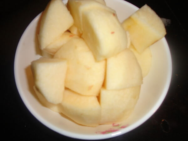 Peel the apple and cut into small pieces
