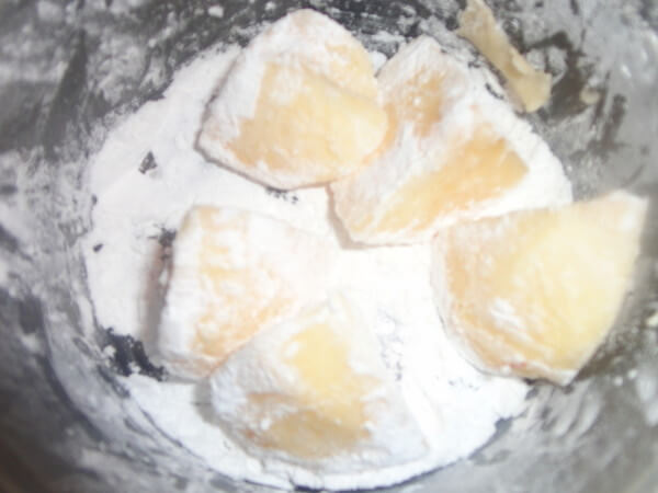 Wrap a layer of raw powder on the outside