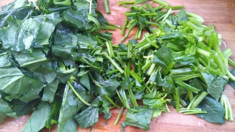 Wash spinach and cut into segments