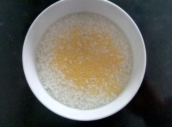 Wash the rice and millet water twice,