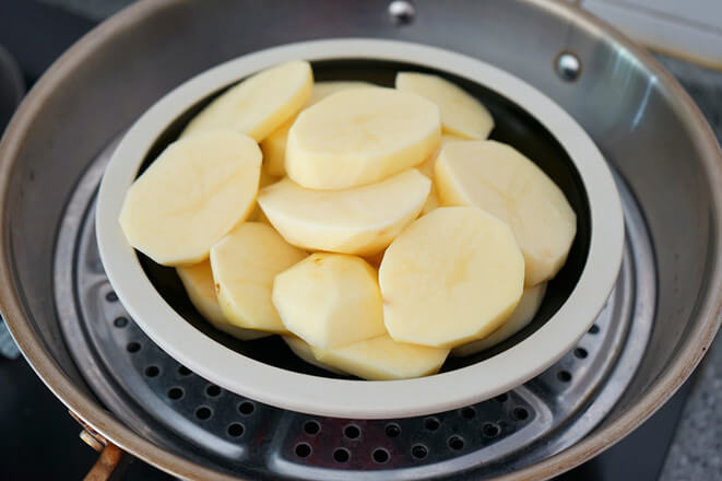 Peel and cut pieces in a larger container.