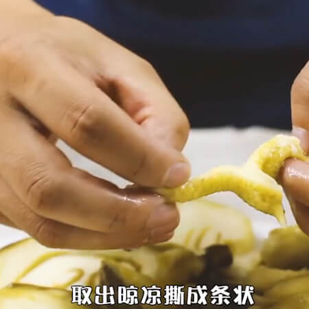 Take it out and let it cool to tear it into strips.