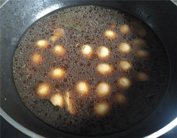After cooking until the quail eggs are basically colored,