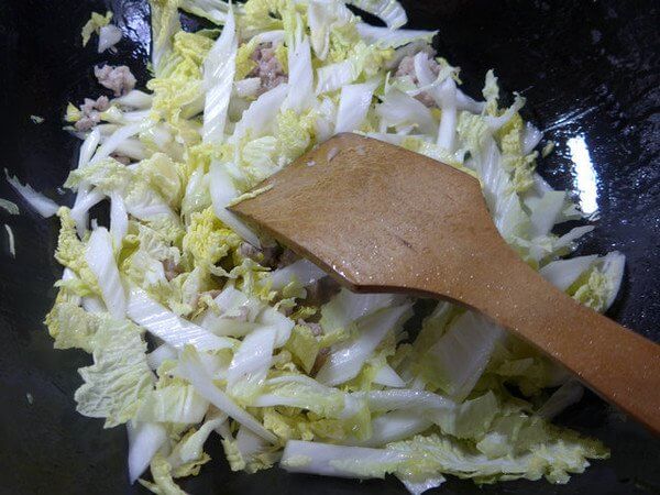Next, stir in the cut baby dishes and stir fry