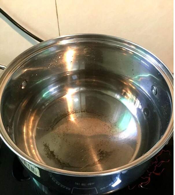 Add more water into the soup pot